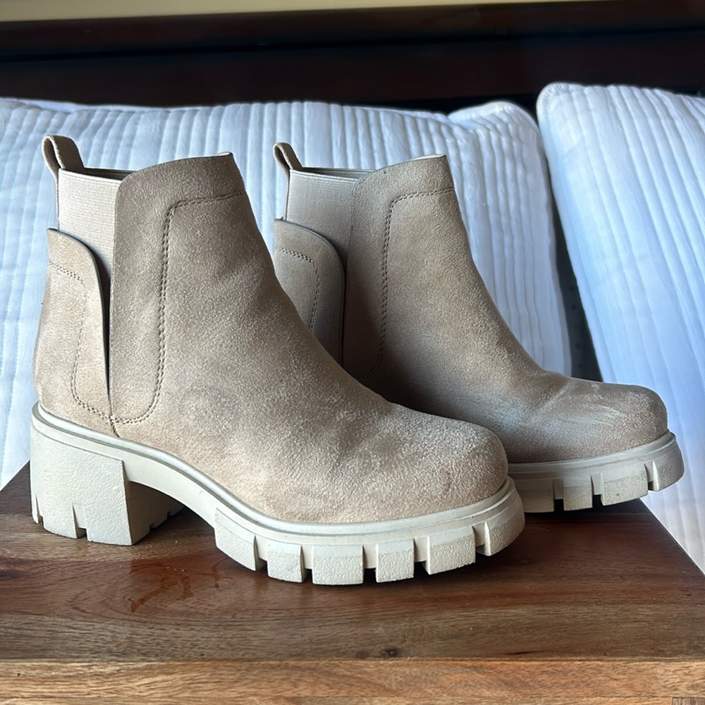 SODA synthetic suede. Lug sole is a hard resin like material. Stretchy opening